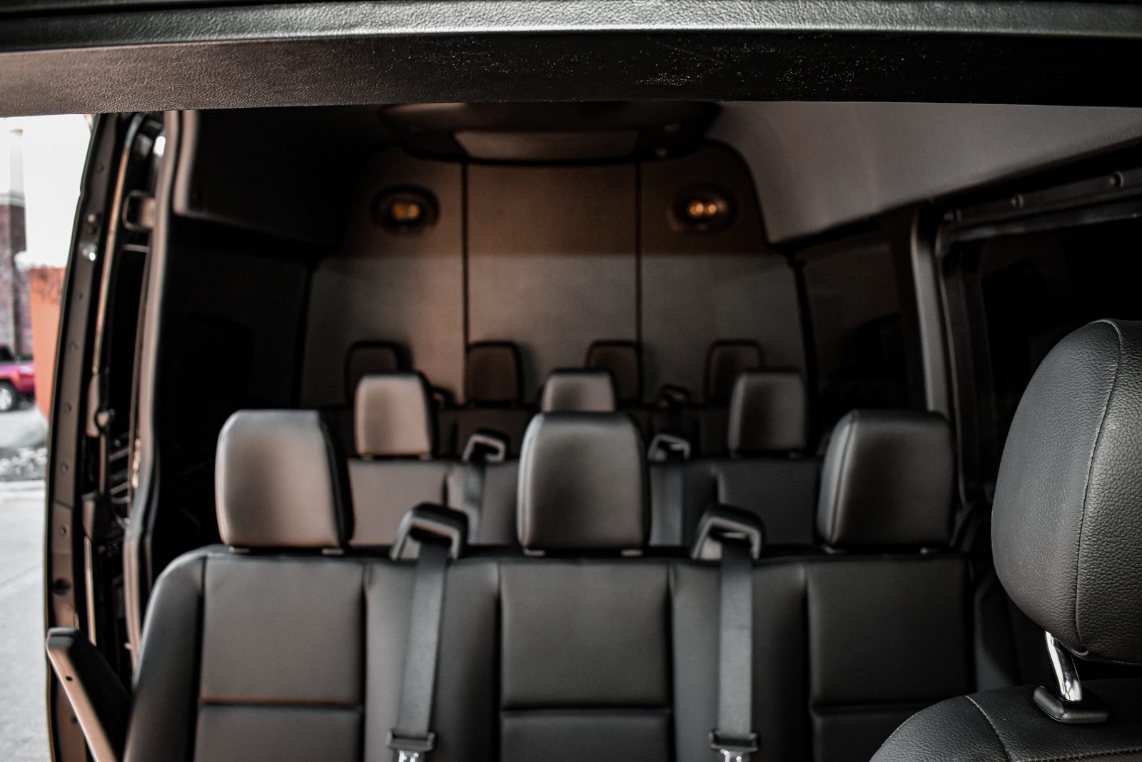Passenger Sprinter interior with rows of comfortable seats